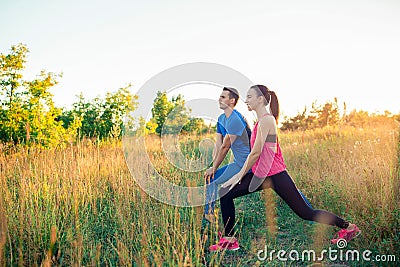 Active sportive couple running in park. Health and fitness. Stock Photo