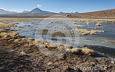Active volcano Putana also known as Jorqencal or Machuca near Vado Rio Putana in Atacama Desert, Chile Stock Photo