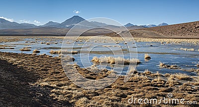 Active volcano Putana also known as Jorqencal or Machuca near Vado Rio Putana in Atacama Desert, Chile Stock Photo