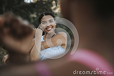 Active women stretching together outdoors Stock Photo