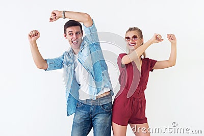 https://thumbs.dreamstime.com/x/active-young-couple-friends-having-good-time-raising-hands-up-dancing-laughing-together-white-background-70270673.jpg