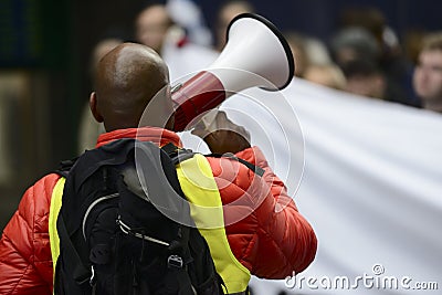 Activist with the megaphone Editorial Stock Photo