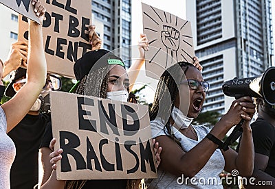 Activist movement protesting against racism and fighting for equality - Demonstrators from different age and race manifesting Stock Photo