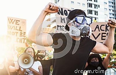 Activist movement protesting against racism and fighting for equality - Demonstrators from different cultures and race protest Stock Photo