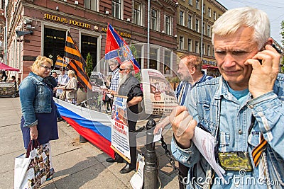 Activists of the pro-Putin anti-western organization NLM SPb (National Liberation movement), on the Nevsky Prospekt. Editorial Stock Photo