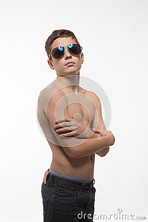 Actor athlete brunette boy in sunglasses Stock Photo