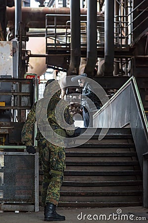 Actor at the filmset in an abandoned industrial building Editorial Stock Photo