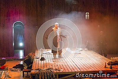 Actor on stage during a theatre play Editorial Stock Photo