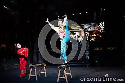 Actors performing Sichuan rolling lights Editorial Stock Photo