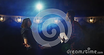 Actors rehearsing a scene in a theater Stock Photo