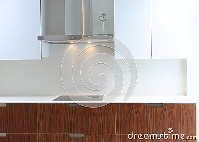 Actual modern kitchen in white and walnut wood Stock Photo
