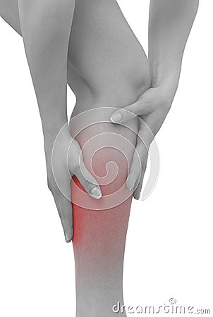 Acute pain in a woman calf Stock Photo