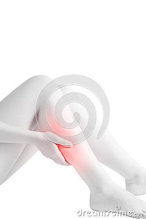 Acute pain in a woman calf leg isolated on white background. Clipping path on white background. Stock Photo