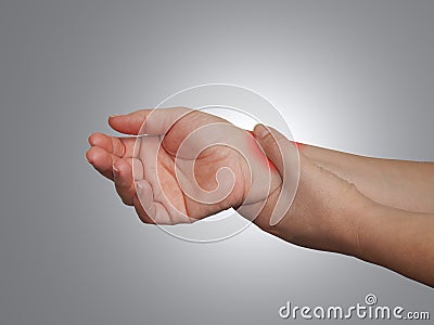 Acute pain in a woman wrist Stock Photo