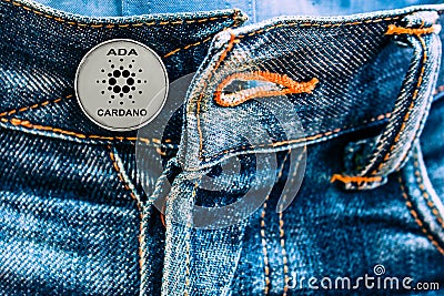 ADA coin instead of buttons on jeans. Editorial Stock Photo