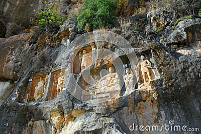Adamkayalar - rock carved figures. Turkey Stock Photo