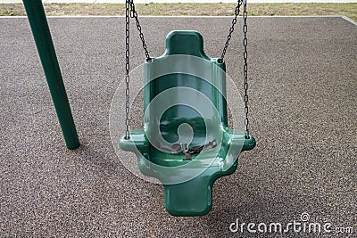 Adaptive Buckle Toddler swing at a children`s park and recreation area Stock Photo