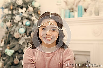 Add some glitz and glam to your look. Happy girl smile with Christmas look. New year eve party look of small child. Give Stock Photo