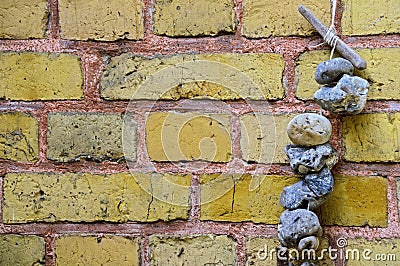 Adder stones on a string Stock Photo