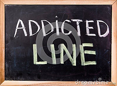 Addicted line word on blackboard Stock Photo