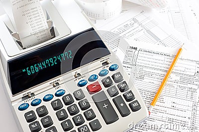 Adding Machine with tax forms Stock Photo