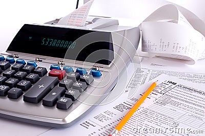 Adding Machine with tax forms Stock Photo