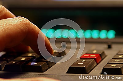 Adding Numbers on Calculator Stock Photo