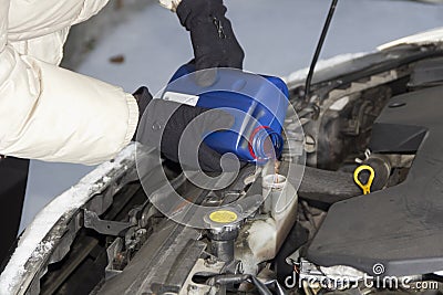 Adding radiator fluid Stock Photo