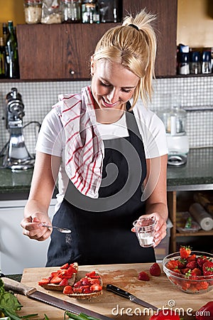 Adding sugar Stock Photo