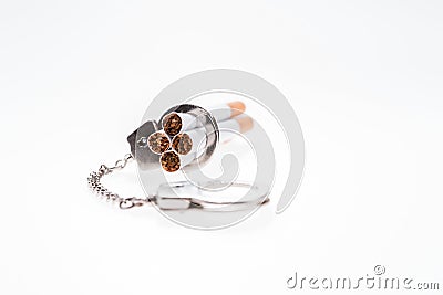 Addition concept with cigarettes and handcuffs on white Stock Photo