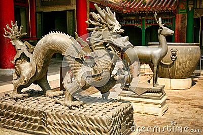 Bronze statues of the dragon and deer in the Forbidden City. Beijing Stock Photo