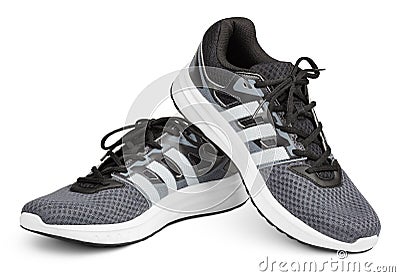 Adidas running shoes, sneakers or trainers isolated on white Editorial Stock Photo