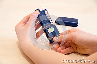 Adjusting dose of insulin Stock Photo