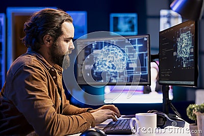 Admin using computer for artificial intelligence computing Stock Photo