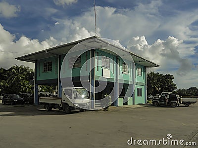 Administration building and parking around it in Peleliu North Harbor Port Editorial Stock Photo