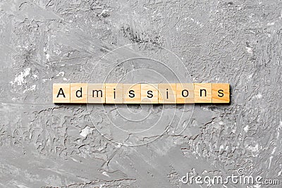 Admissions word written on wood block. admissions text on table, concept Stock Photo