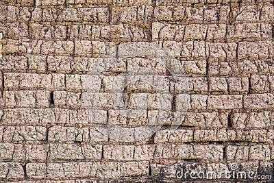 Adobe bricks wall made of mud and straw Stock Photo