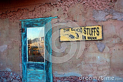 Adobe style building with vintage sign Stock Photo