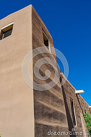 The Adobe Walls of Sacred Heart Catholic Church Stock Photo