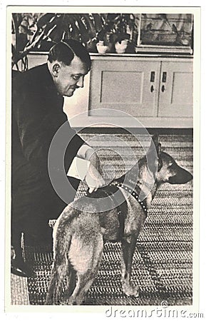 Adolf Hitler and his dog. Hitler was leader of nazi Germany. Reproduction of antique photo Editorial Stock Photo