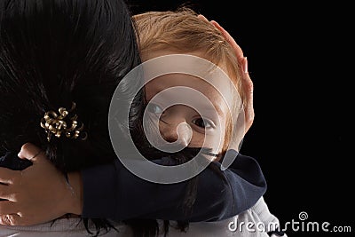 Adoption concept, an orphan is a little boy and his new mother. Happy childhood, caring for children. Stock Photo