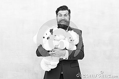 Adoption is wonderful thing. Happy man hold soft toys. Businessman dream of children. Adoptive parent. Adoption of child Stock Photo