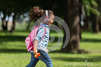 African american schoolkid in headphones Stock Photo