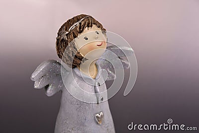 Cute baby girl angel statuette stock images Stock Photo