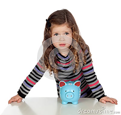Adorable baby with a blue money-box Stock Photo
