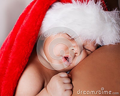 Adorable Baby in Christmas Santa Hat Stock Photo