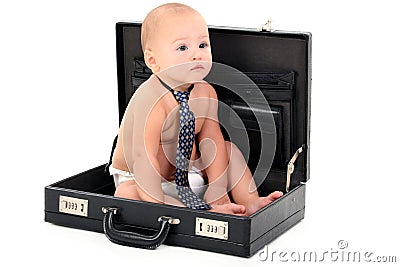 Adorable Baby Wearing Diaper and Tie Sitting in Briefcase Stock Photo