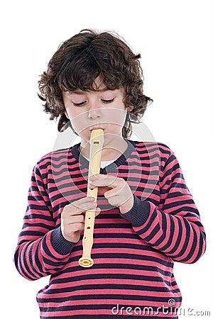 Adorable child playing flute Stock Photo