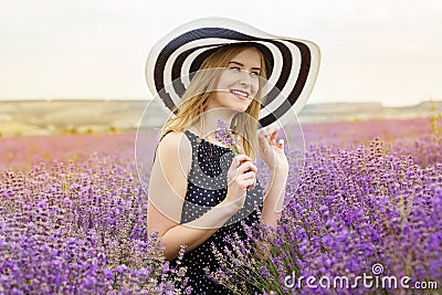 Adorable girl in fairy field of lavender Stock Photo