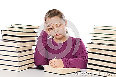 Adorable girl tired with many books Stock Photo